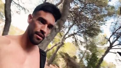 Fitness man walking fully naked on abandoned building