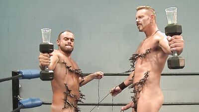 Colin Steele And Jessie Balboa Pinch Each Other With Pegs