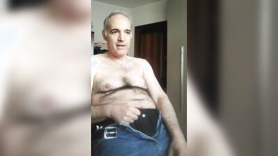 Davide, during a live show, calls a slutty friend of his because he is horny and wants to cum.