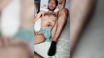 Guy with hairy lumberjack body jerking off his bushy dick and smelling musky socks and briefs