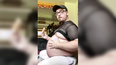 Fat ex-jock stuffs face in tight pants