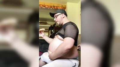 Fat ex-jock stuffs face in tight pants