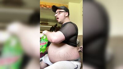 Fat ex-jock stuffs face in tight pants