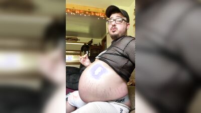 Fat ex-jock stuffs face in tight pants