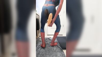 Spiderman cums while riding massive dildo