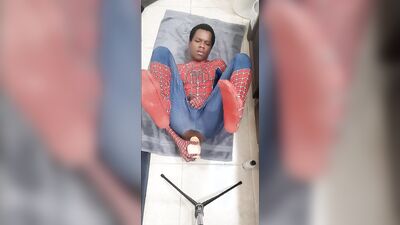 Spiderman cums while riding massive dildo