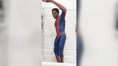 Spiderman cums while riding massive dildo
