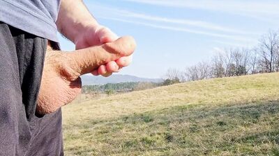 Big dick cum twice in the middle of huge meadow, anybody could watch me
