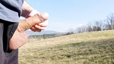 Big dick cum twice in the middle of huge meadow, anybody could watch me
