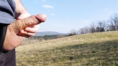 Big dick cum twice in the middle of huge meadow, anybody could watch me