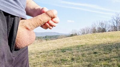 Big dick cum twice in the middle of huge meadow, anybody could watch me