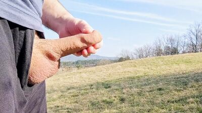 Big dick cum twice in the middle of huge meadow, anybody could watch me