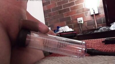 Pumping my cock and balls at the same time, then jacking off with my balls pumped hard