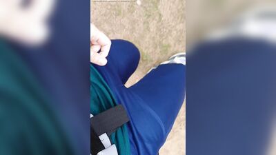 Sexy guy walks in the woods and jerks off his cock in his tight sweatpants