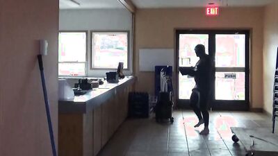 wetsuited guy at windows