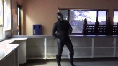wetsuited guy at windows