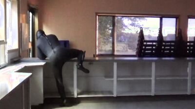 wetsuited guy at windows