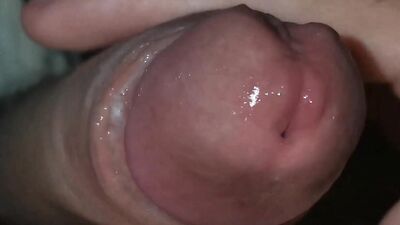 very close-up red head and fresh cock juice