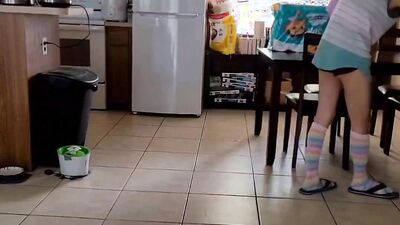 Doing small chores around the house while I slowly undress