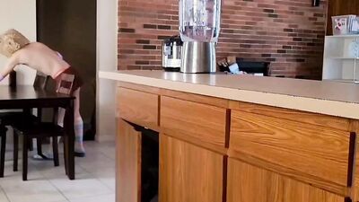Doing small chores around the house while I slowly undress