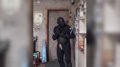 double cocked fantasy in a wetsuit