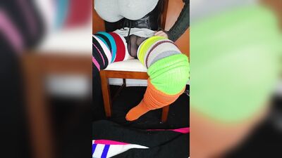 Putting on 12 pairs of thigh high socks