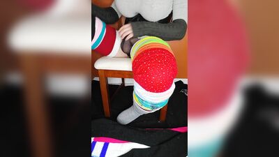 Putting on 12 pairs of thigh high socks