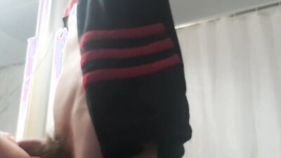 Amateur dude plays with his toy in front of the camera