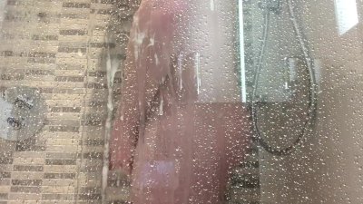 Amateur chubby lad is jerking his dick in the shower