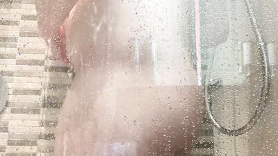 Amateur chubby lad is jerking his dick in the shower