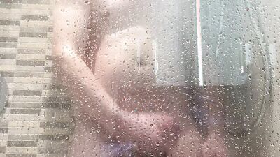 Amateur chubby lad is jerking his dick in the shower
