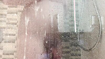 Amateur chubby lad is jerking his dick in the shower