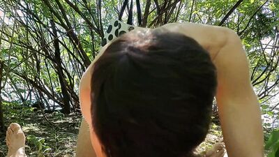 Young twink gets a tasty cumload from an older stranger at nude beach while public cruising
