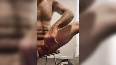 Naughty DILF stroking his uncut cock with slow motion cumshot