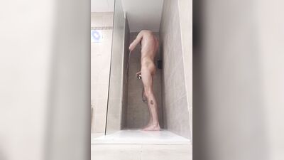 Compilation of Very tall skinny male with juicy cock taking a warm shower while on a holiday