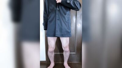 A perverted Japanese guy wearing only a long coat and a thong masturbates in front of the camera.