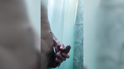 Showering cock ends in good cumshot