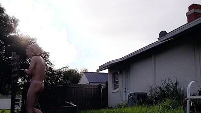 jerking off after trimming the grass in nothing but a thong