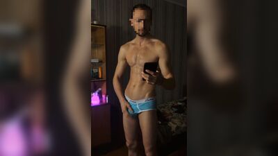 A guy with a big dick in oil