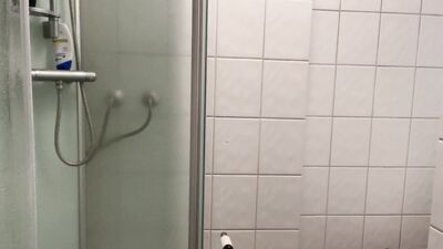 Nude dance during taking a shower.