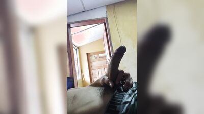 Masturbating my cock with the door open.