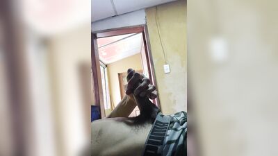 Masturbating my cock with the door open.