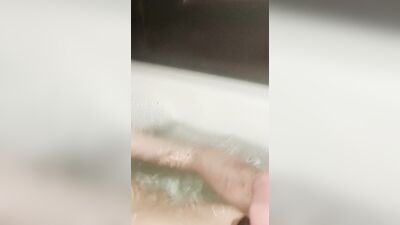 guy takes a bath & comes at the same time