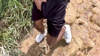 exhibitionist gets naked in the middle of the mountain