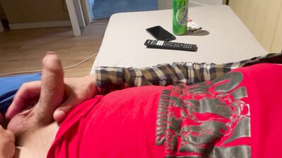 Jerking off and drinking my favorite beer.