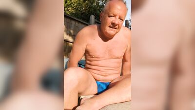 In the sun in a g-string and less