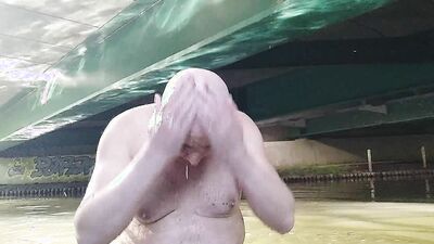 Fat pig Pascal masturbates in the humidity and mud under a bridge