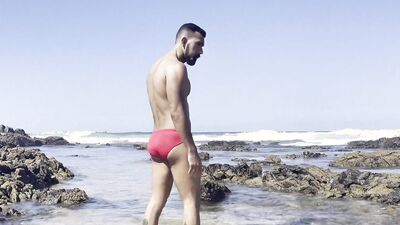 Showing off around the Beach - Red Thong