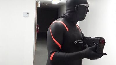 cumming inside orca wetsuit at door