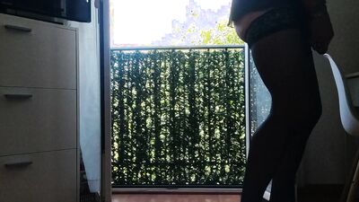 At the Window in Lingerie and Heels and Anal Plug